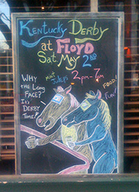 It's Derby time chalk drawing adorning Floyd's bar window